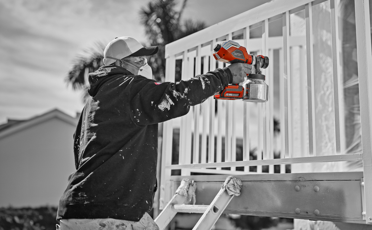 Titan Flexspray Pro in use spraying deck spindles